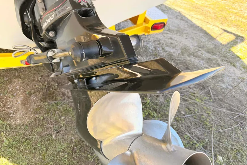 Slide: The Image of Close-up of a 2005 Crownline 270 BR boat's MerCruiser Bravo Three outdrive and propeller. - 5