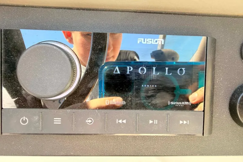 Slide: The Image of Fusion Apollo stereo system on a 2005 Crownline 270 BR boat dashboard. - 7