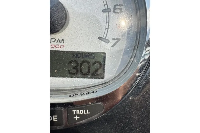 Slide: The Image of Close-up of a Regency 230 LE3 2019 hour meter displaying 302 hours. - 17