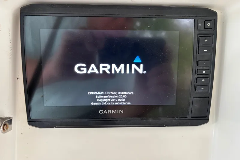 Slide: The Image of Garmin ECHOMAP UHD 74sv on 1999 Contender 21 Open boat dashboard. - 22