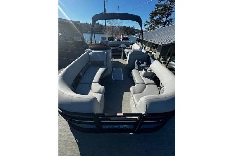 Slide: The Image of 2021 Bennington 23 LXS Swingback pontoon boat with spacious seating and canopy. - 10