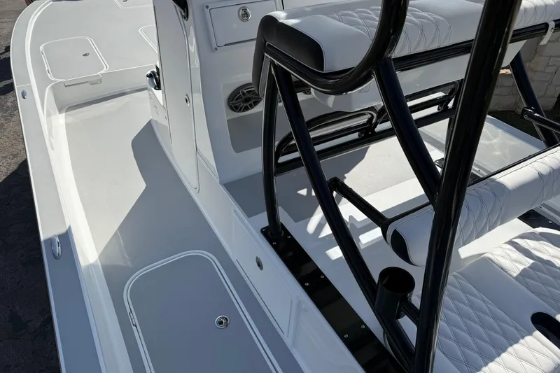 Slide: The Image of 2026 Shallow Sport 25 X3 boat interior with sleek seating and modern design. - 17