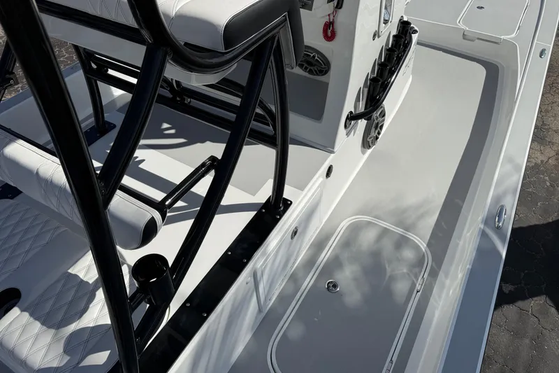 Slide: The Image of 2026 Shallow Sport 25 X3 boat interior with sleek seating and modern design. - 18