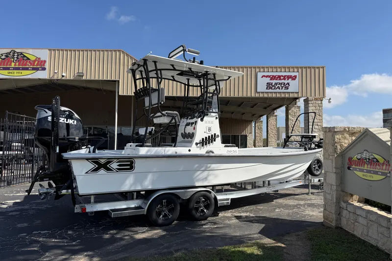 Slide: The Image of 2026 Shallow Sport 25 X3 boat on trailer at South Austin Marine dealership. - 3