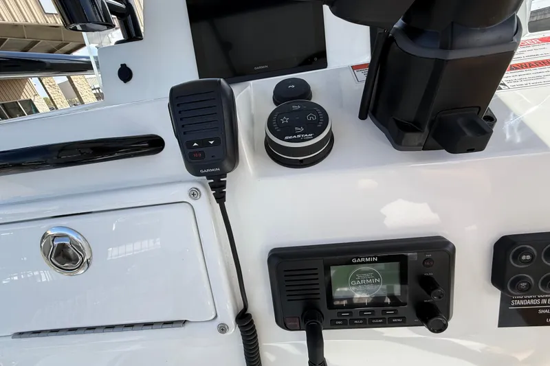 Slide: The Image of Control panel of 2026 Shallow Sport 25 X3 boat with Garmin devices. - 32