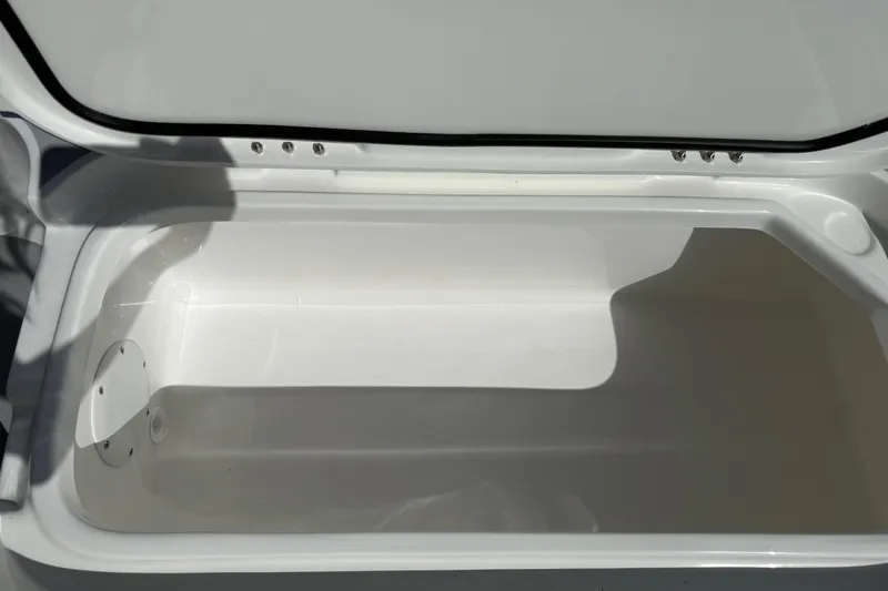 Slide: The Image of Open storage compartment of 2026 Shallow Sport 25 X3 boat. - 52