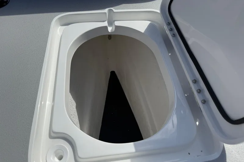 Slide: The Image of Open storage compartment on 2026 Shallow Sport 25 X3 boat. - 55