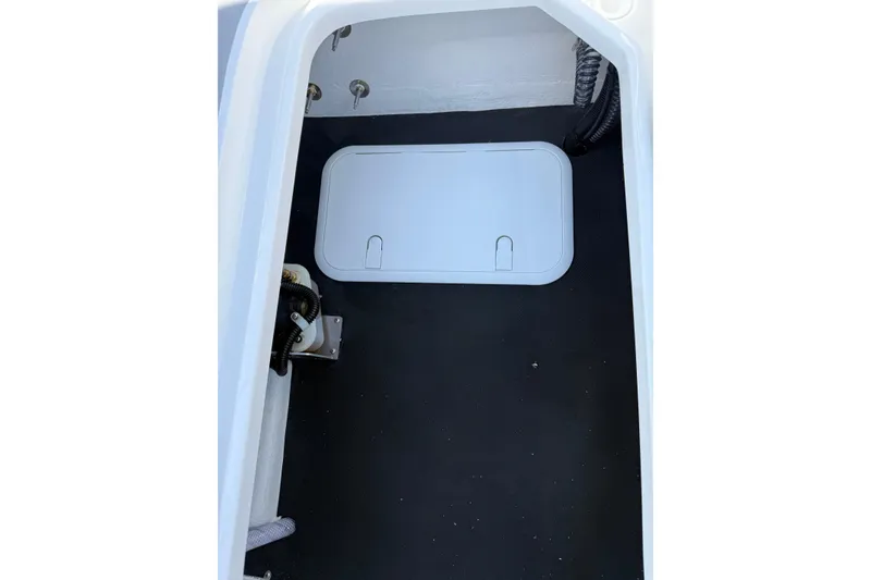 Slide: The Image of Interior view of 2026 Shallow Sport 25 X3 boat compartment with hatch. - 9