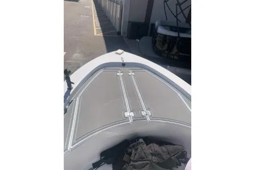 Slide: The Image of 2018 Sportsman Island Bay 18 boat bow with storage compartments. - 4