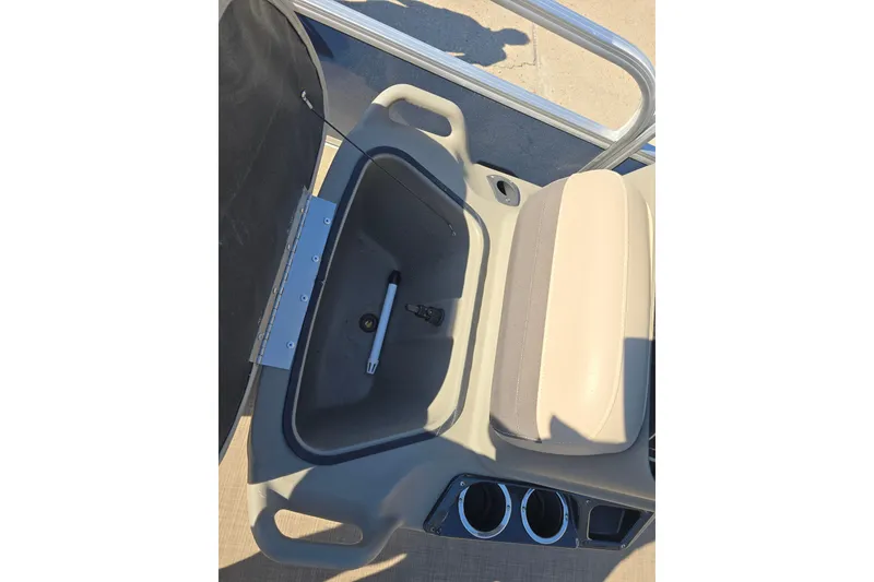 Slide: The Image of 2024 Sun Tracker Bass Buggy 16 XL Select boat seat with storage compartment and cup holders. - 9
