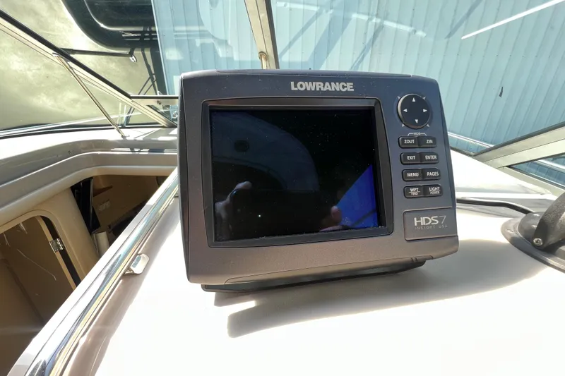 Slide: The Image of Lowrance HDS7 marine GPS on 1998 Sea Ray 290 Sundancer dashboard. - 13