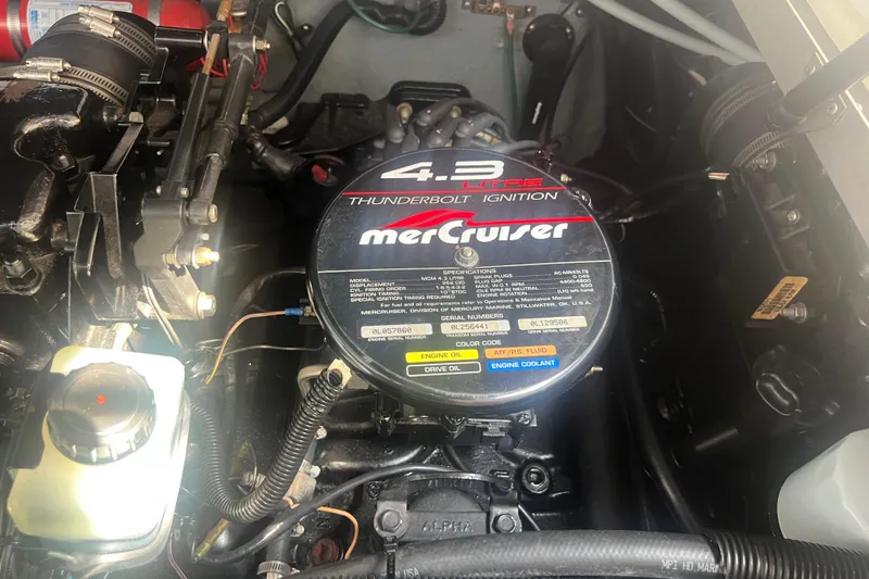 Slide: The Image of Engine compartment of a 1998 Sea Ray 290 Sundancer with MerCruiser 4.3L engine. - 22