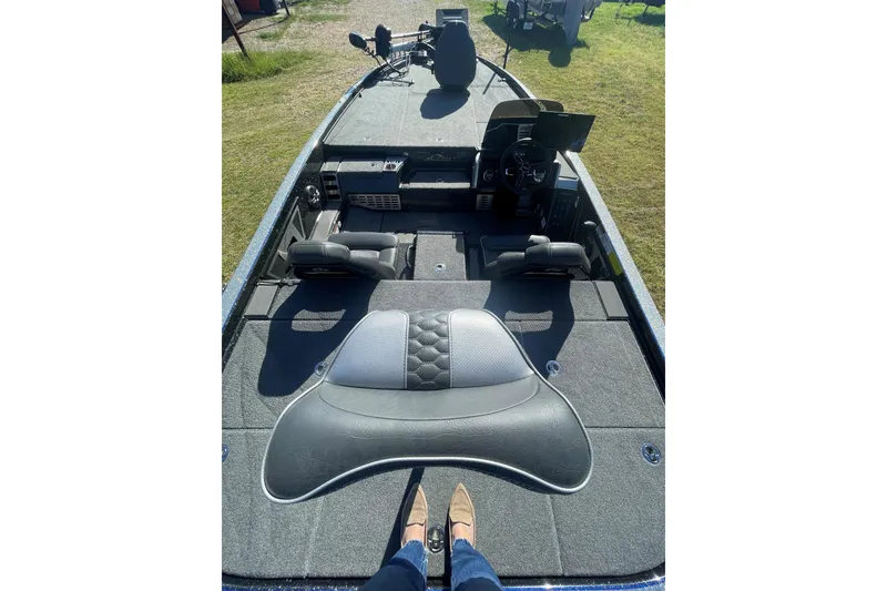 Slide: The Image of 2021 Falcon Boats F20 PREDATOR interior with seating and steering console. - 6