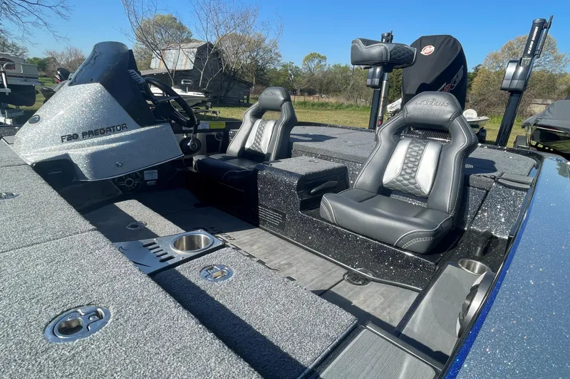 Slide: The Image of 2021 Falcon Boats F20 PREDATOR interior with sleek seating and modern dashboard design. - 8