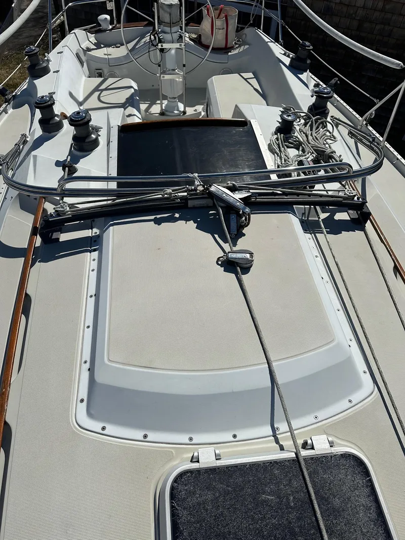 Slide: The Image of 1988 Ericson 34 sailboat deck with rigging and winches. - 4