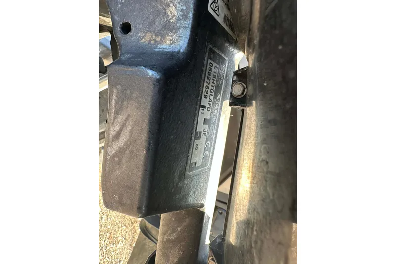 Slide: The Image of Close-up of a 2018 Yar-Craft 219TFX boat component with identification label. - 11