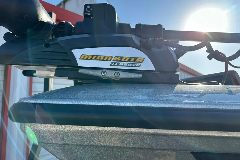 Slide: The Image of Minn Kota Terrova motor on 2018 Yar-Craft 219TFX boat, sunlight in background. - 19