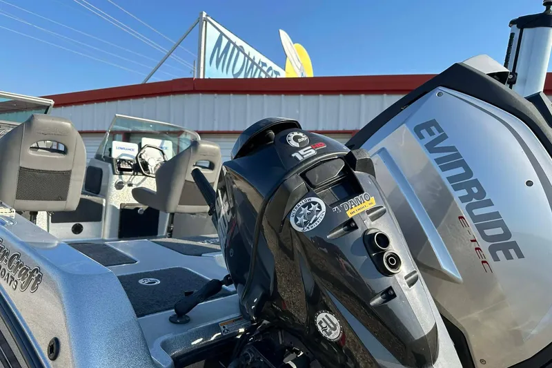 Slide: The Image of 2018 Yar-Craft 219TFX boat with Evinrude E-TEC engine at dealership. - 28