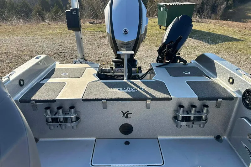 Slide: The Image of 2018 Yar-Craft 219TFX boat stern with motor and rod holders. - 39