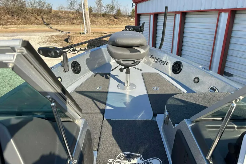 Slide: The Image of 2018 Yar-Craft 219TFX boat interior with seating and fishing equipment. - 49