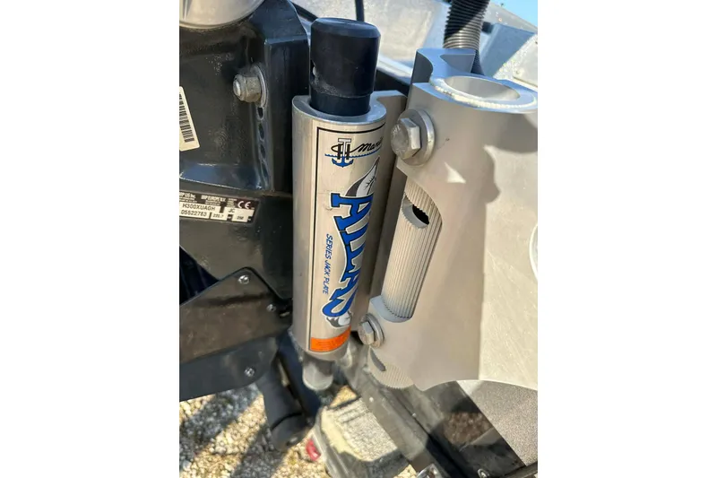 Slide: The Image of Close-up of a 2018 Yar-Craft 219TFX boat component with hydraulic system details. - 5