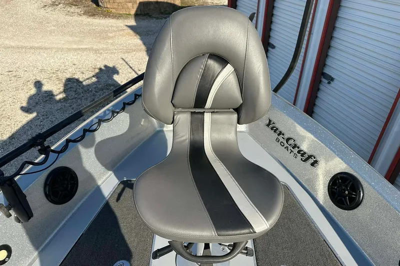 Slide: The Image of 2018 Yar-Craft 219TFX boat seat with sleek gray and black design. - 53