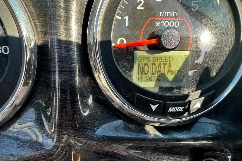 Slide: The Image of Close-up of 2018 Yar-Craft 219TFX dashboard showing tachometer with "GPS Speed No Data." - 8