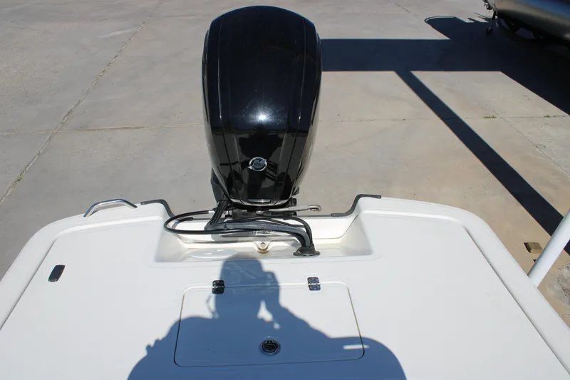 Slide: The Image of 2025 Mako Pro Skiff 17 CC boat engine and deck view. - 10