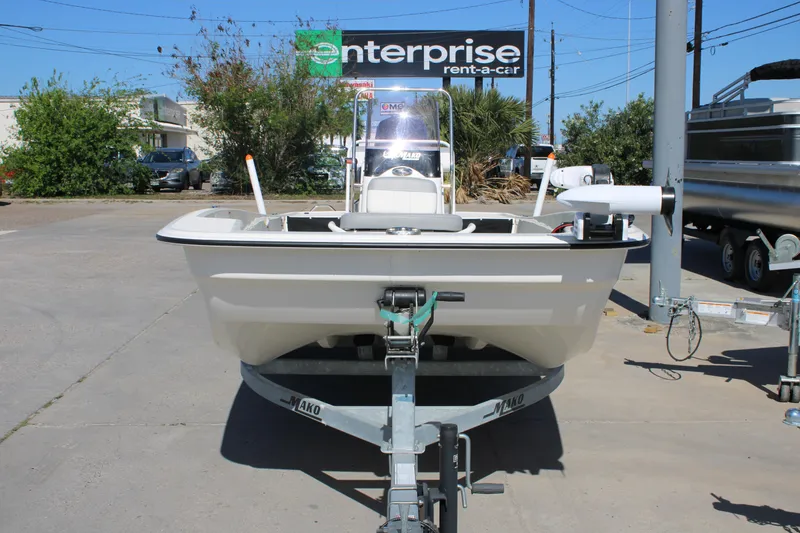 Slide: The Image of 2025 Mako Pro Skiff 17 CC boat on trailer at Enterprise Rent-A-Car location. - 13