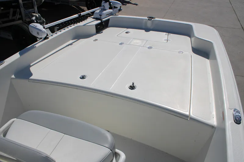 Slide: The Image of 2025 Mako Pro Skiff 17 CC boat deck with seating and storage compartments. - 3