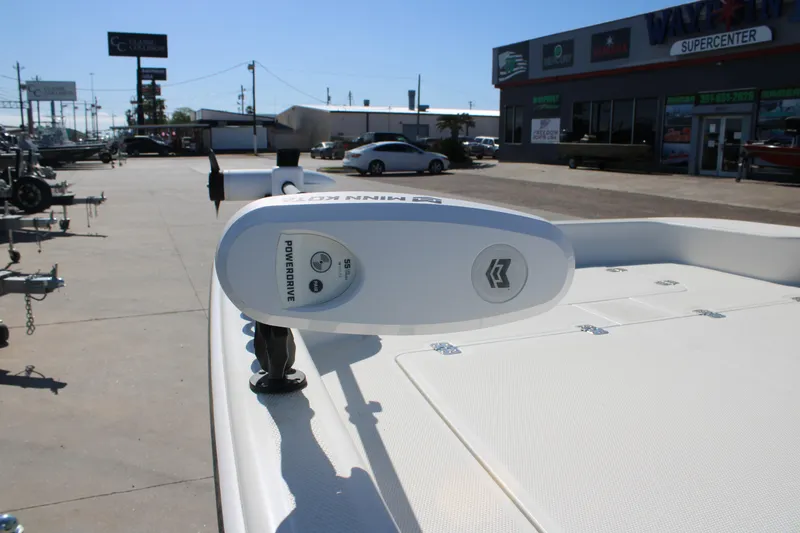 Slide: The Image of 2025 Mako Pro Skiff 17 CC with Minn Kota PowerDrive motor at dealership. - 6