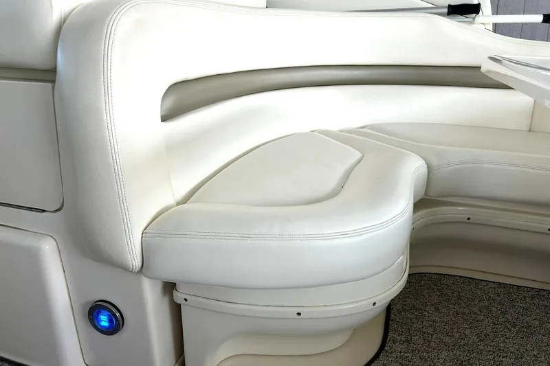 Slide: The Image of Luxurious white seating on a 2006 Sea Ray Sundancer 320 yacht interior. - 20
