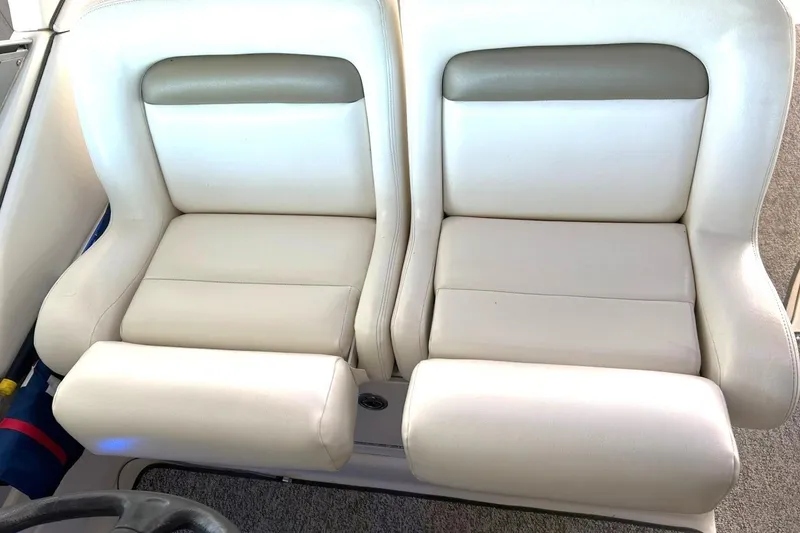 Slide: The Image of Cream leather seats on 2006 Sea Ray Sundancer 320 boat. - 28