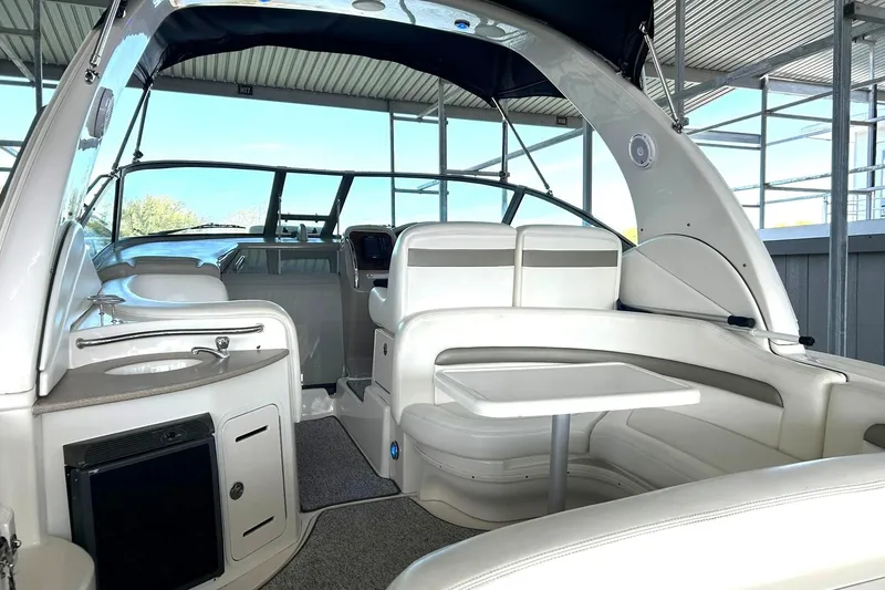 Slide: The Image of Interior view of 2006 Sea Ray Sundancer 320 yacht with seating and kitchenette. - 3