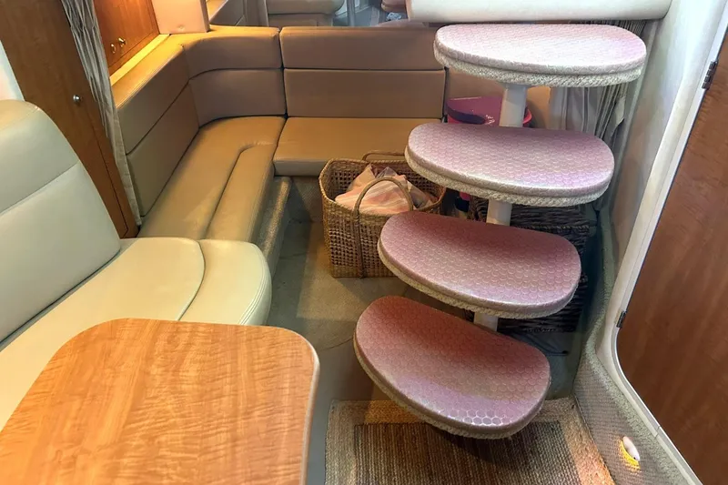 Slide: The Image of Interior of 2006 Sea Ray Sundancer 320 with curved seating and spiral stairs. - 41