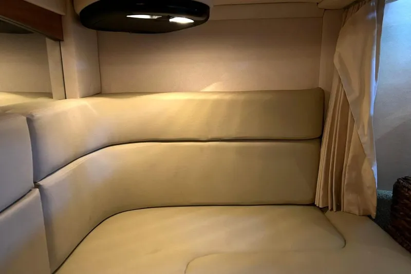 Slide: The Image of Interior seating area of a 2006 Sea Ray Sundancer 320 yacht. - 51