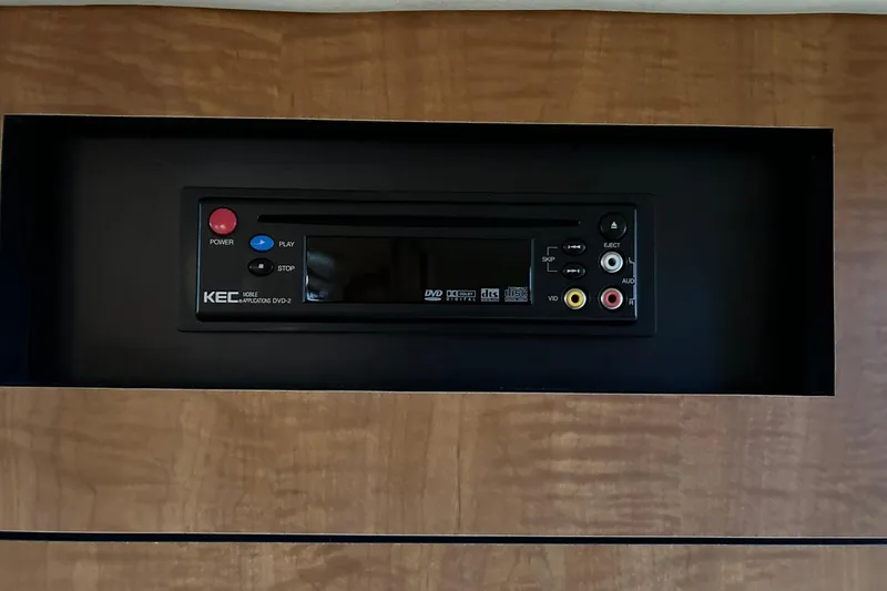 Slide: The Image of KEC DVD player in 2006 Sea Ray Sundancer 320 boat interior. - 55