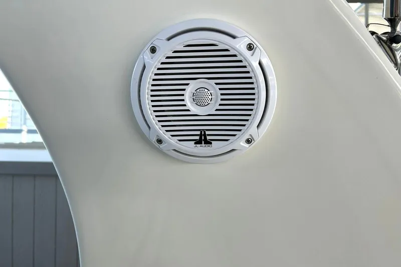 Slide: The Image of White JL Audio speaker on 2006 Sea Ray Sundancer 320 yacht interior. - 56