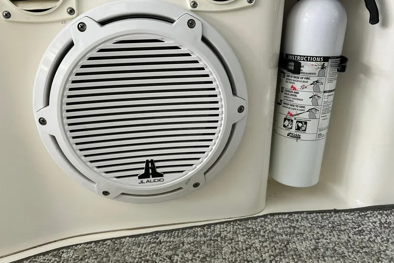 Slide: The Image of JL Audio speaker and fire extinguisher on 2006 Sea Ray Sundancer 320 boat. - 57