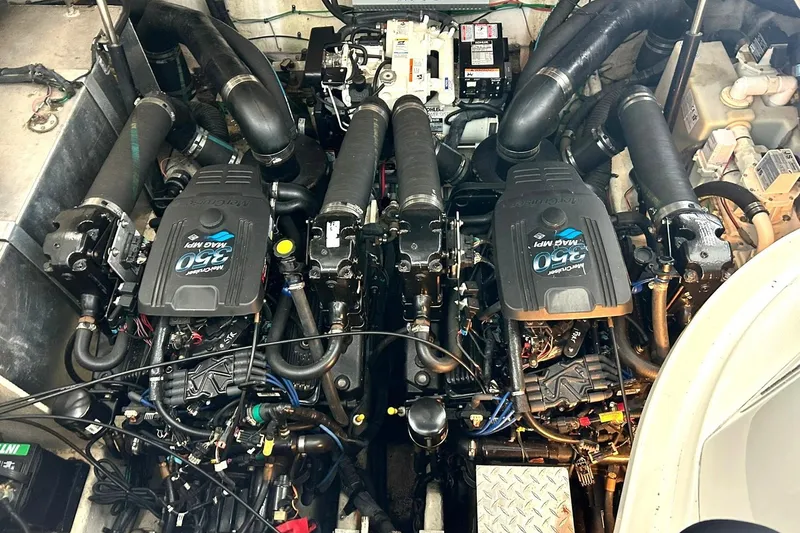 Slide: The Image of Engine compartment of a 2006 Sea Ray Sundancer 320 with twin MerCruiser 350 MAG MPI engines. - 6
