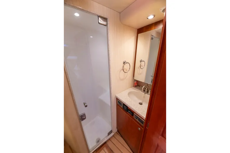 Slide: The Image of Bathroom interior of 2015 Ocean Yachts 37 Express with shower and vanity. - 18