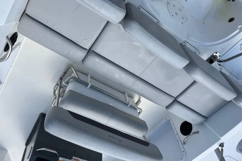 Slide: The Image of Interior view of 2020 Hurricane Center Console 19 OB boat with cushioned seating. - 11
