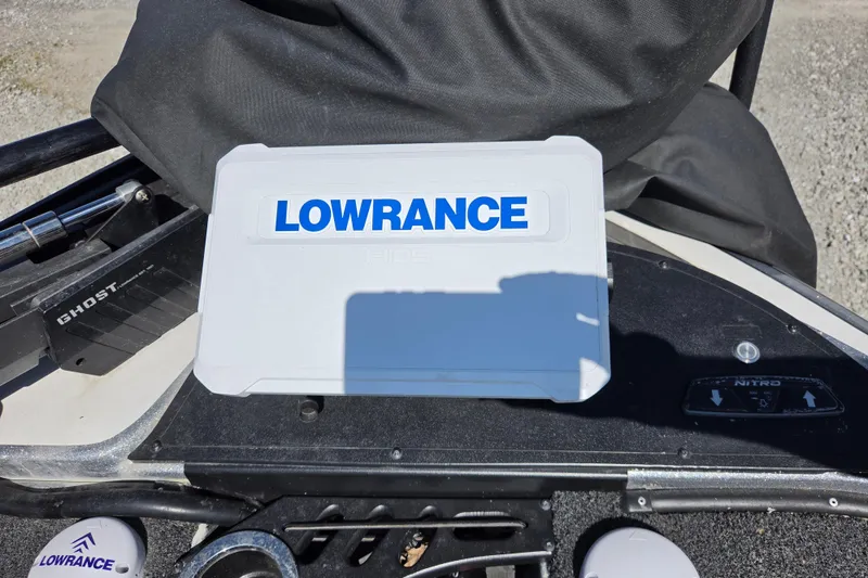 Slide: The Image of Lowrance device on 2023 Nitro Z20 boat dashboard, featuring Ghost trolling motor. - 4