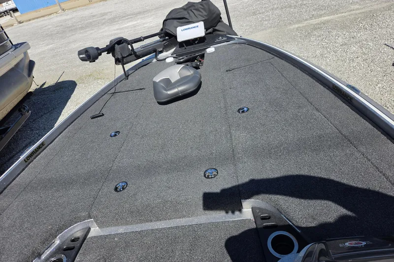 Slide: The Image of 2023 Nitro Z20 boat deck with fishing equipment and Lowrance electronics. - 6