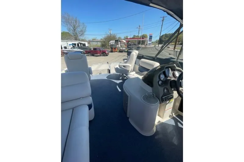 Slide: The Image of 2009 Premier 221 Cast-A-Way boat interior with seating and control panel. - 5