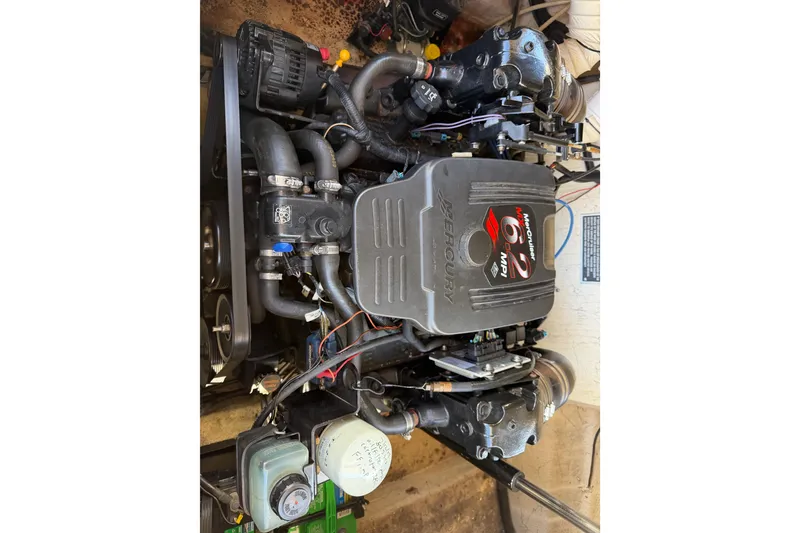 Slide: The Image of Engine of 2003 Rinker 282 Captiva Bowrider, featuring Mercury 6.2 MPI motor. - 12