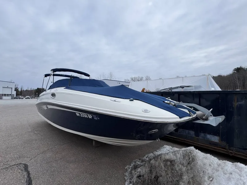 Slide: The Image of 2010 Sea Ray 280SD boat parked outdoors. - 3
