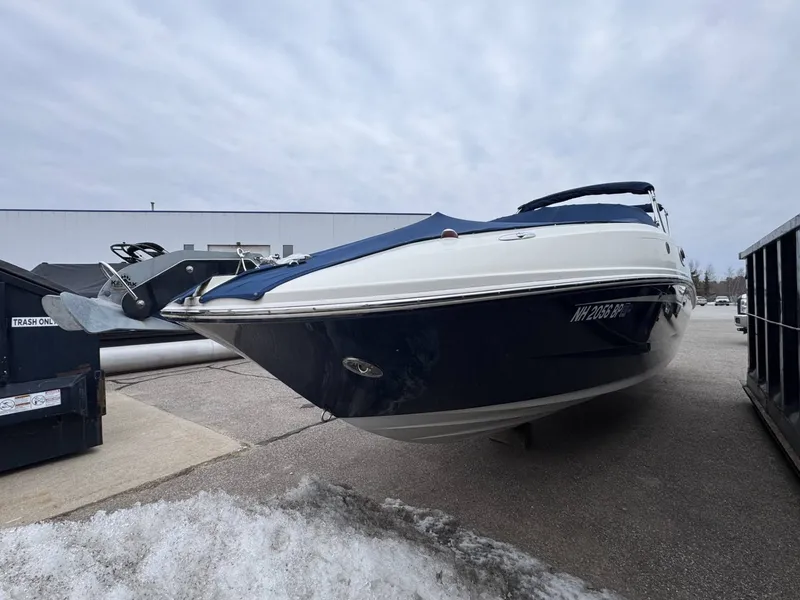 Slide: The Image of 2010 Sea Ray 280SD boat parked on a lot. - 9