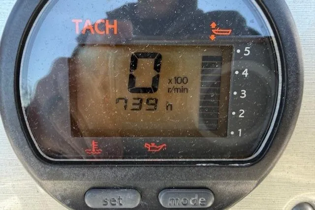 Slide: The Image of Tachometer display showing 739 hours on a 2012 Sea Hunt Triton 225 boat. - 16