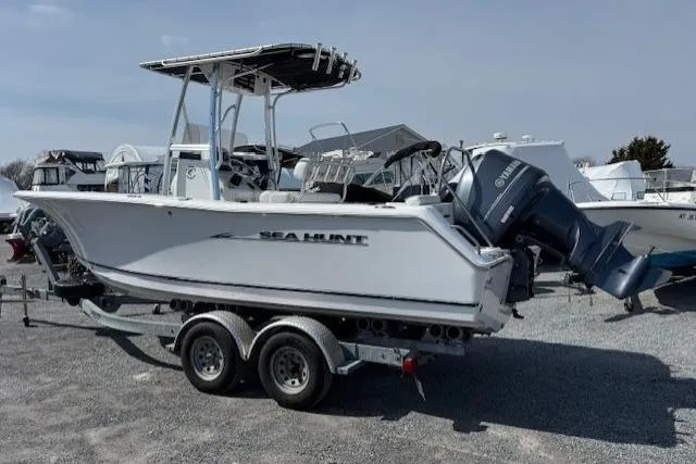 Slide: The Image of 2012 Sea Hunt Triton 225 boat on trailer with Yamaha outboard motor. - 5